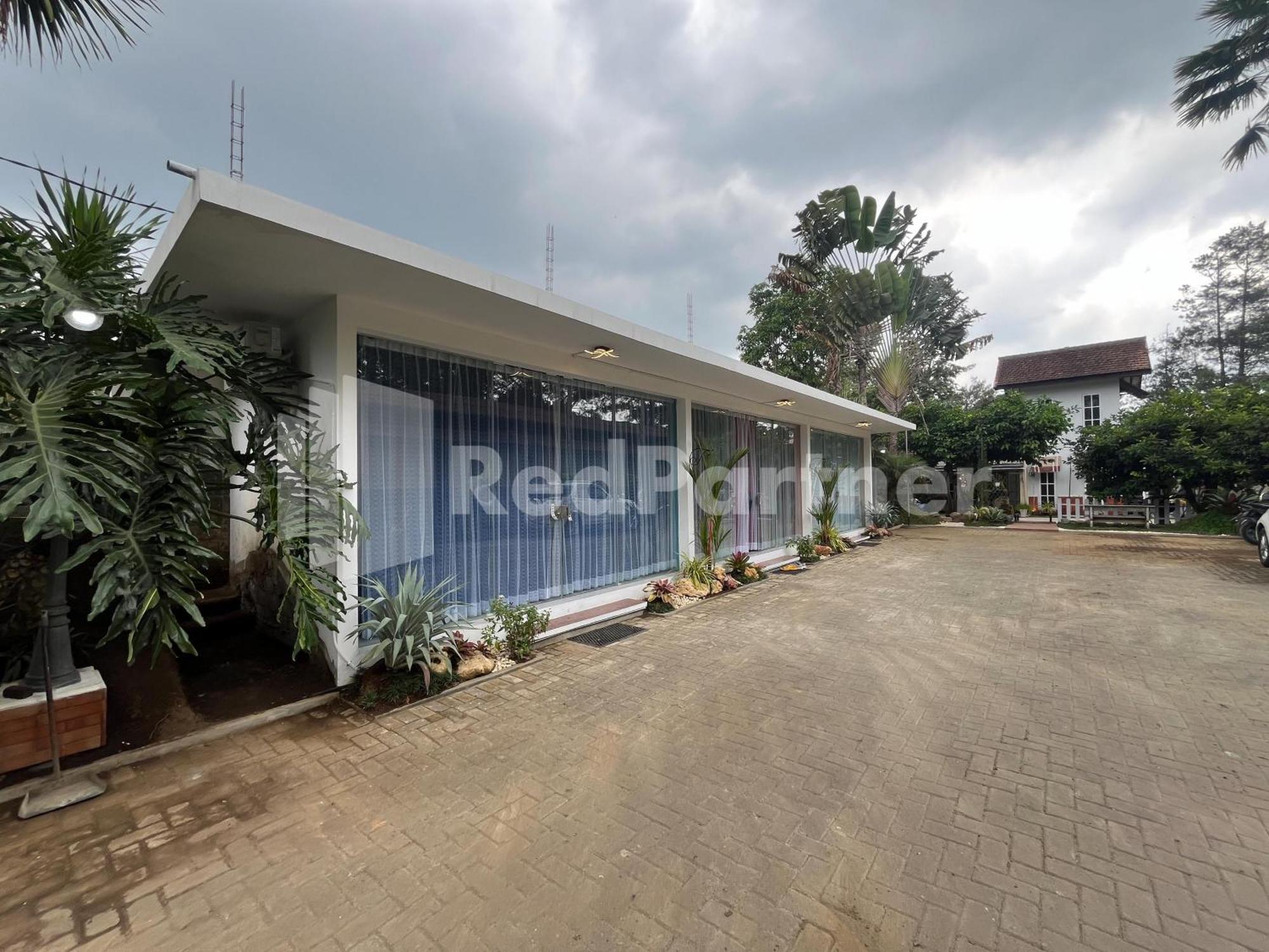 Layar Selorejo Mitra Reddoorz Malang